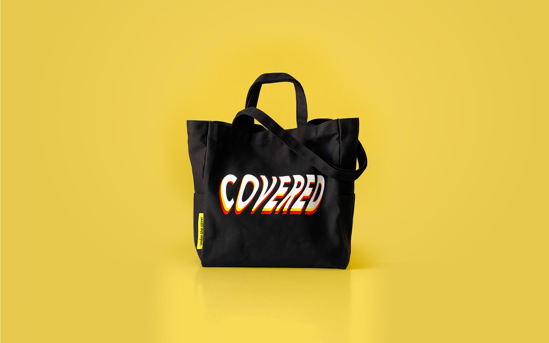 covered-tote-bag-under-the-cover-slider